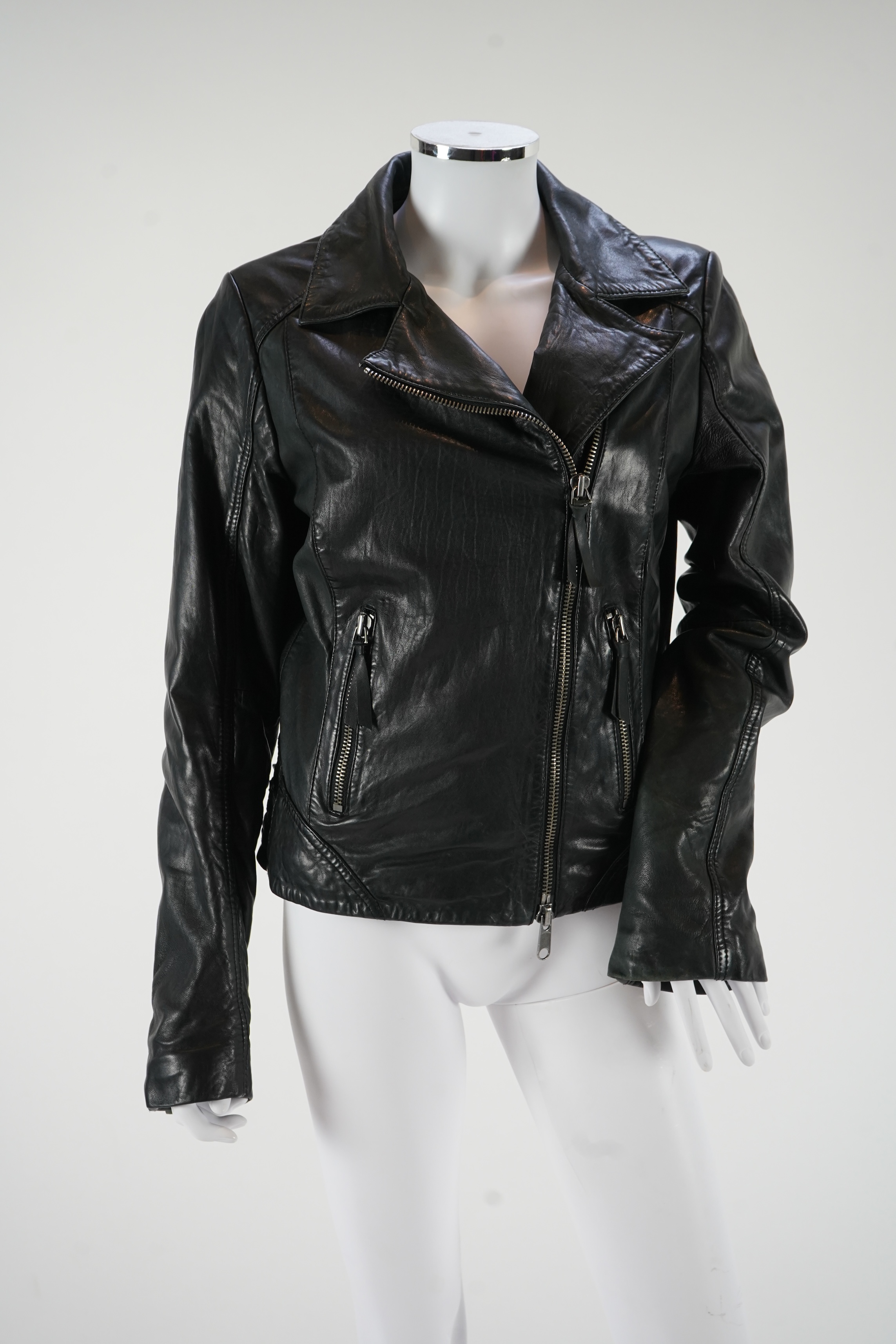 A lady's Marco Polo black leather biker jacket, a Feraud black cashmere blazer and a Basler pink velvet padded jacket. sizes 12-14